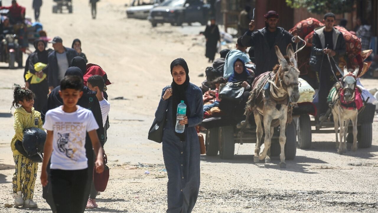 People fleeing Rafah arrive in nearby Khan Yunis following new Israeli evacuation orders on Monday