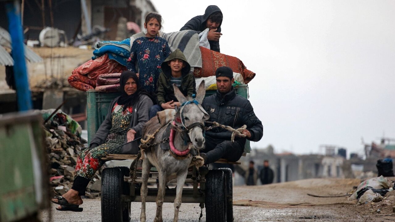 Palestinians used donkey carts to transport their belongings as they fled Beit Lahia in the northern Gaza Strip.