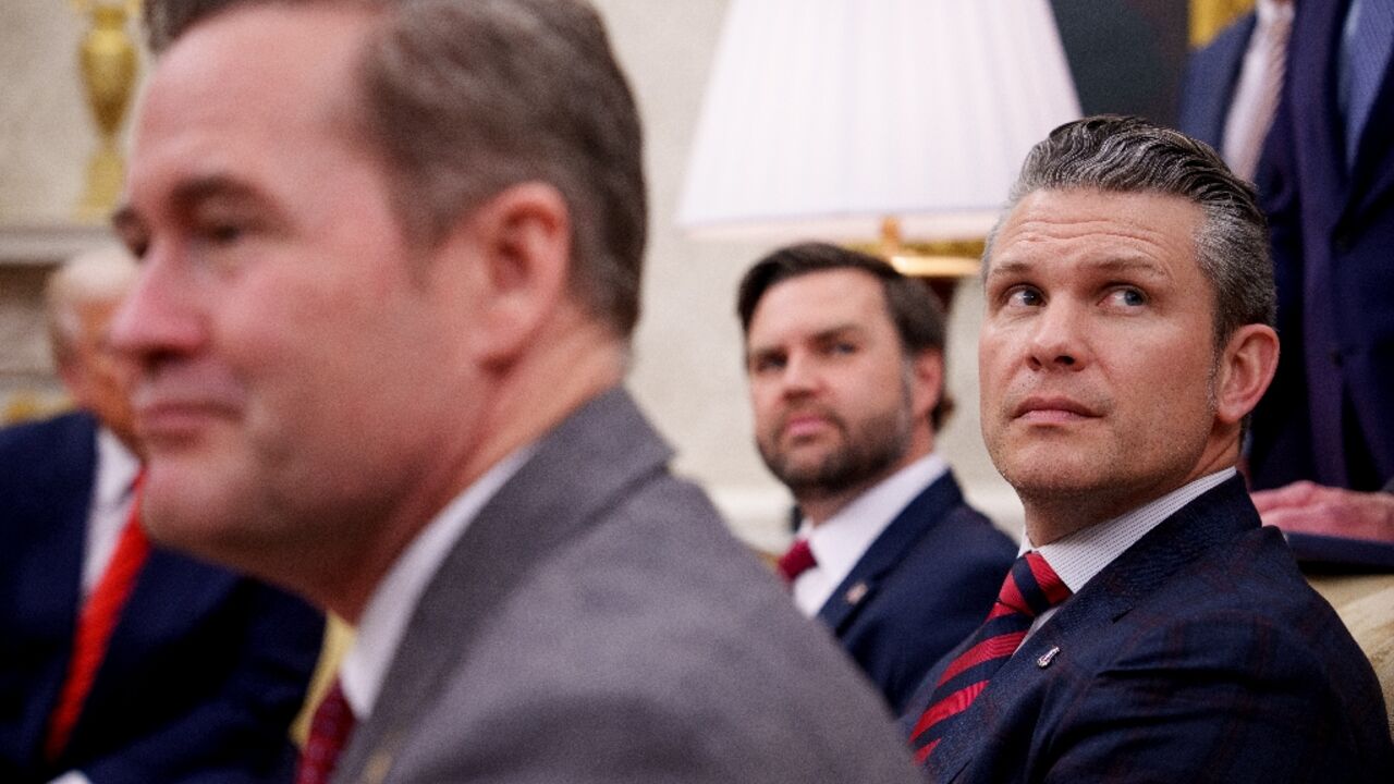 Top Trump administration officials including National Security Advisor Mike Waltz (L), Vice President JD Vance (C), and Defense Secretary Pete Hegseth (R) were all in the chat group