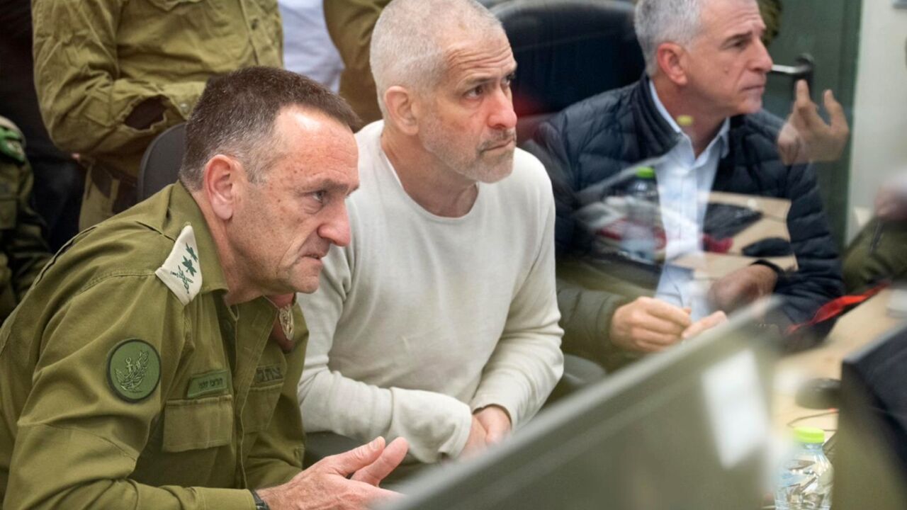 Shin Bet director Ronen Bar (C) is flanked by the then armed forces chief and the head of the Mossad intelligence agency in the situation room during an exchange of hostages for Palestinian prisoners in January.