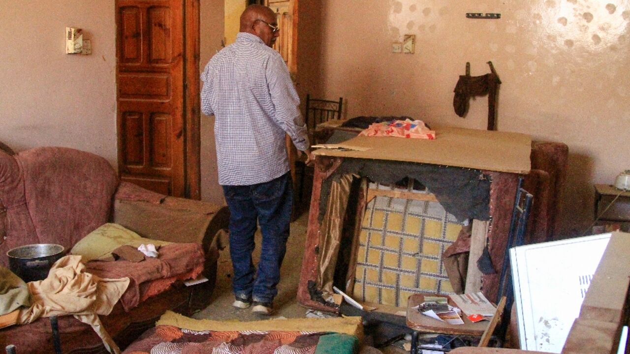 AFP journalist Abdelmoneim Abu Idris Ali in his ransacked home in Khartoum