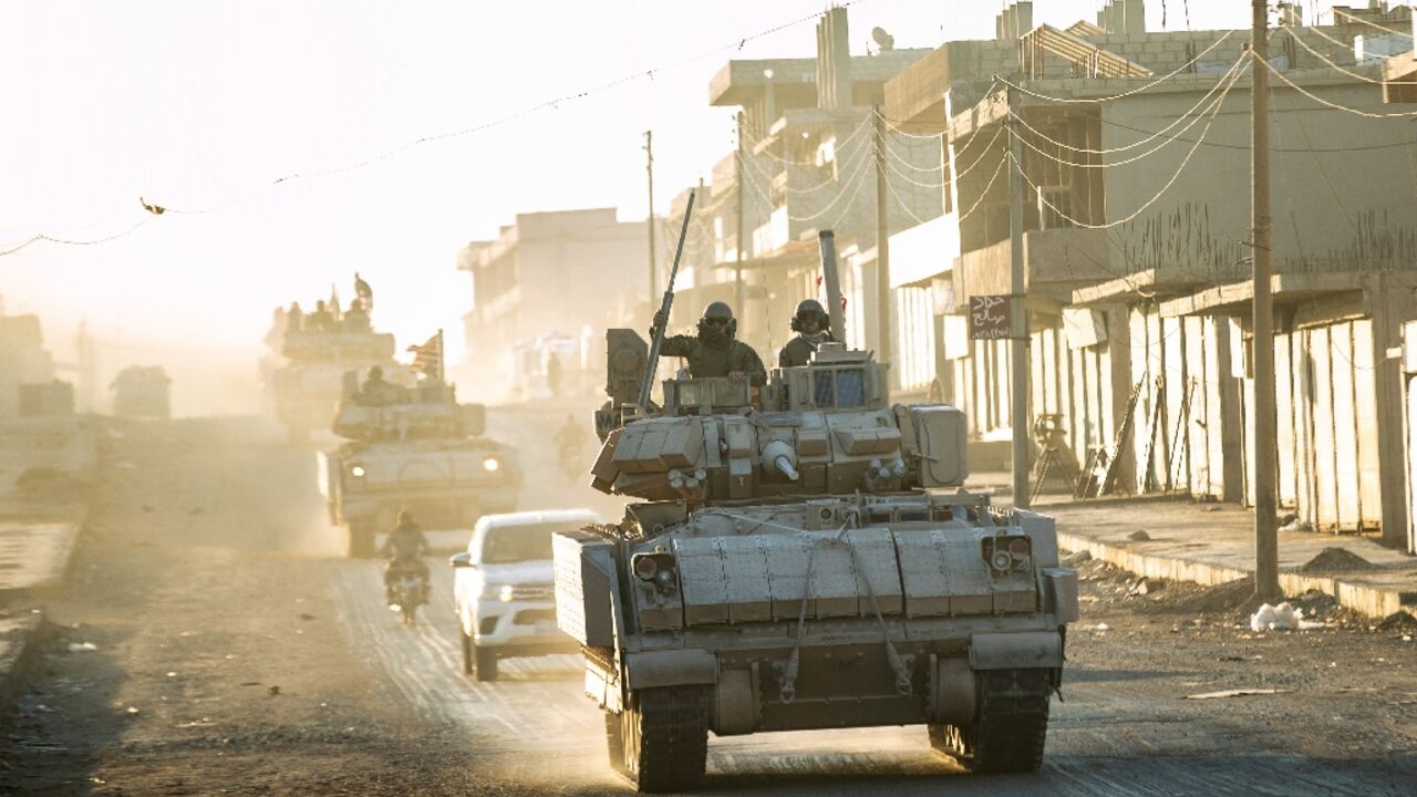 US forces patrol near Syria's northeastern border with Turkey on September 3, 2024