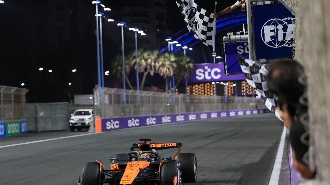 McLaren's Oscar Piastri takes the chequered flag to win the Saudi Arabia Grand Prix 