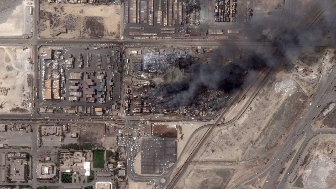 A satellite photo obtained from Planet Labs PBC and dated April 28, 2025 shows a column of smoke billowing after an explosion at Iran's Shahid Rajaee port