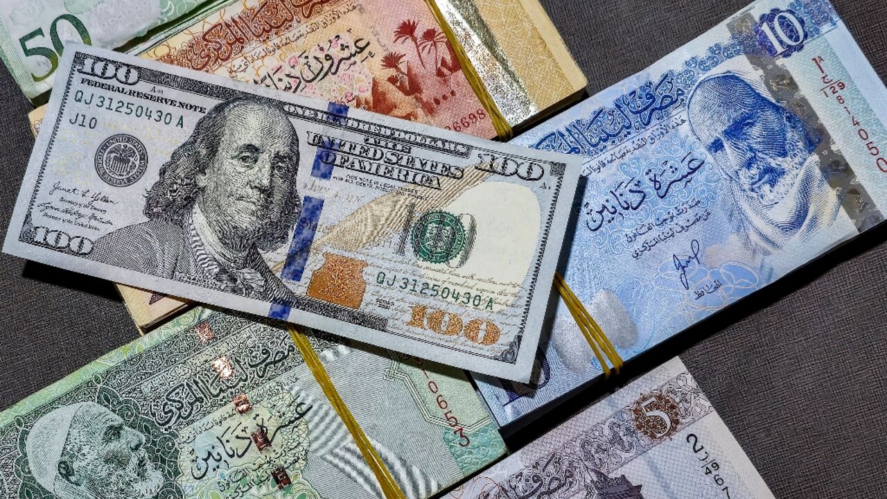 The Libyan central bank earlier this month devalued the dinar by 13.3 percent, the second such move in five years