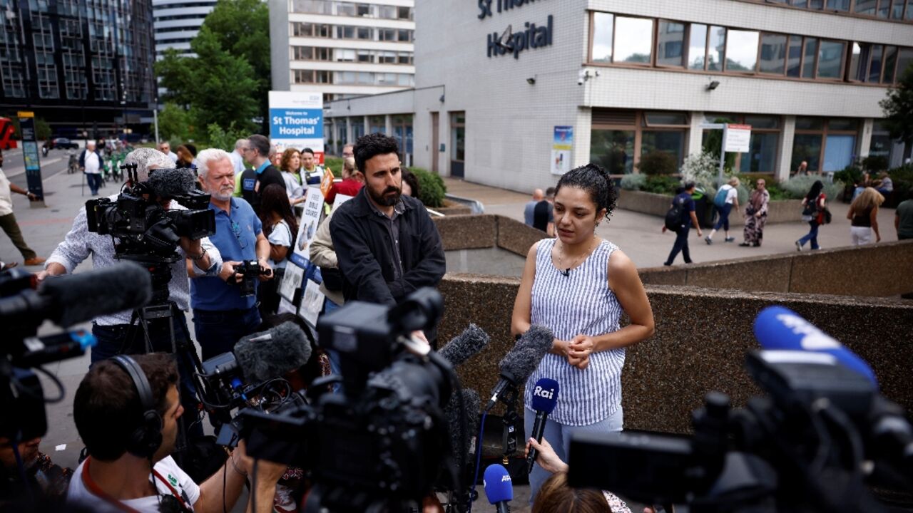Sanaa Seif, sister of jailed activist Alaa Abdel Fattah, speaking to reporters outisde the London hospital where her mother was admitted amid her hunger strike
