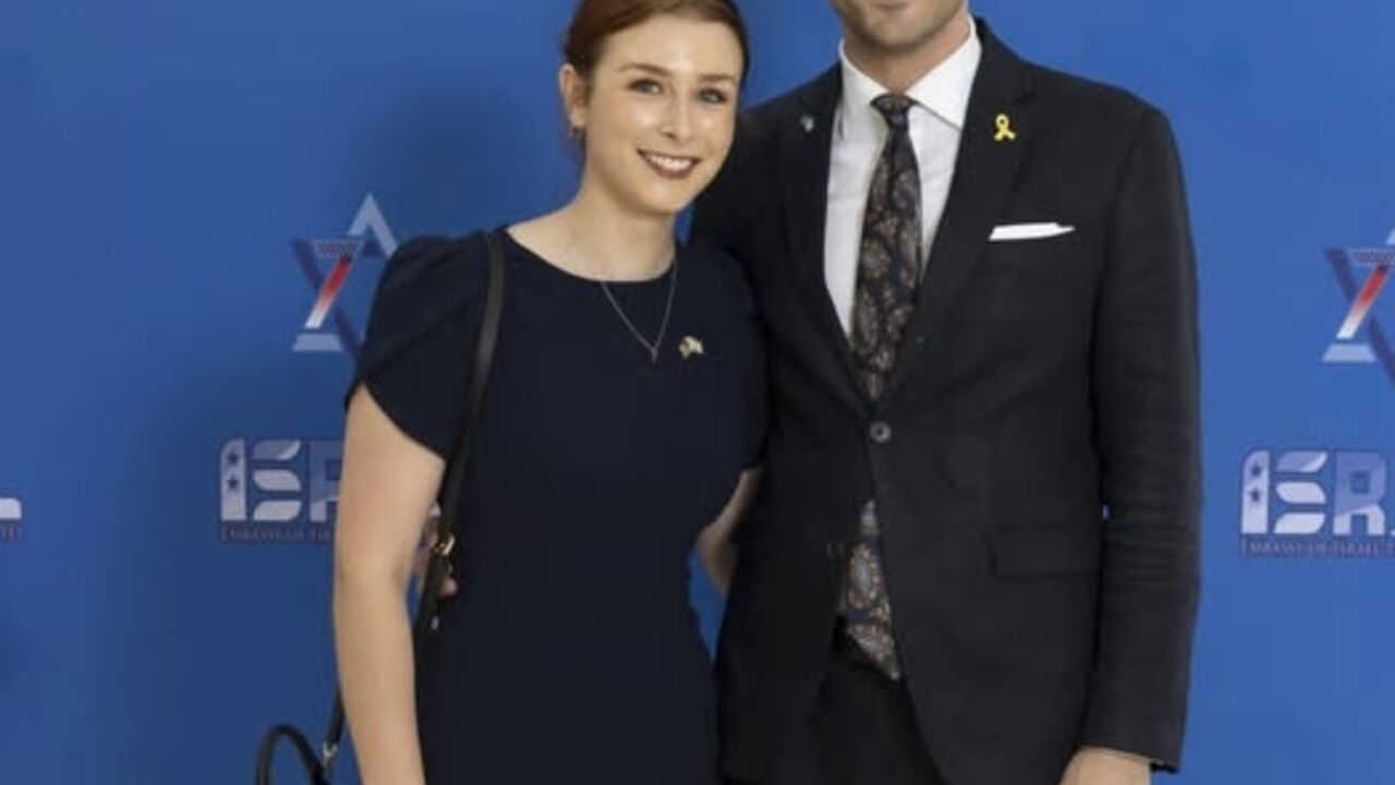 This photograph taken from the official Facebook account of the Embassy of Israel to the United States  shows an undated image of embassy employees Sarah Lynn Milgrim and Yaron Lischinsky