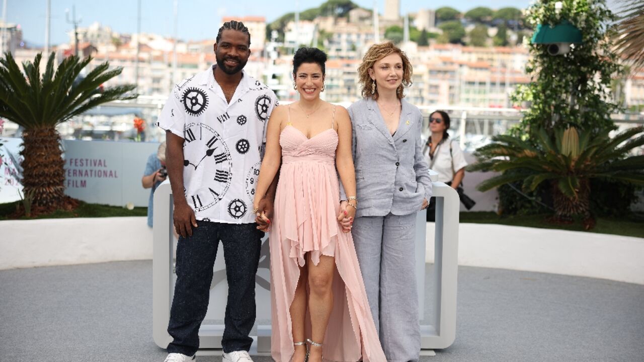Oh mama: (From L) Nigerian actor Martin Obgu, Israeli director Or Sinai and Israeli-Belarusian actor Evgenia Dodina at Cannes