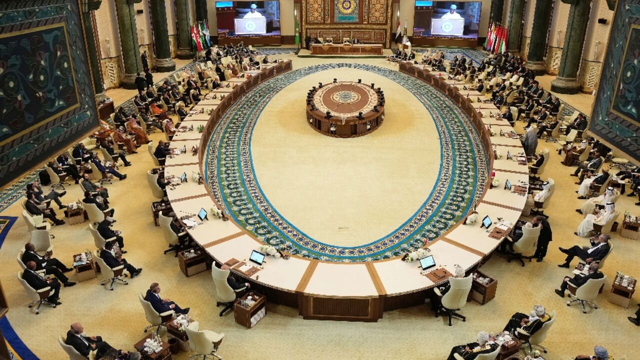 Arab leaders attend the opening session of the 34th Arab League summit in Baghdad