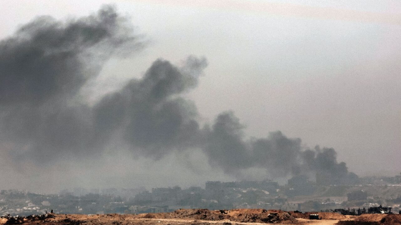 Smoke billows over the Gaza Strip after the Israeli military announced the start of an intensified operation in the territory