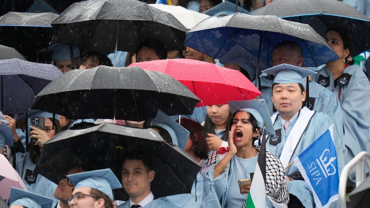A student boos as Columbia University interim  President Claire Shipman speaks during commencement on May 21, 2025
