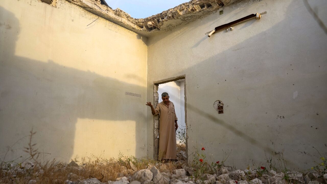 Aref Shamtan, 73: 'I feel good here, even among the rubble'
