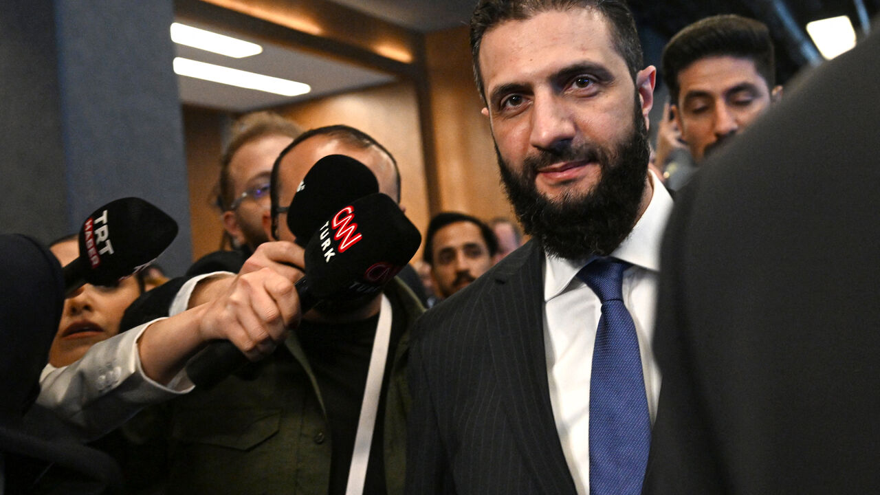 Syria's interim President Ahmed al-Sharaa (C) leaves a bilateral room after his meeting with Qatar's Minister of Foreign Affairs during the Antalya Diplomacy Forum, in Antalya, on April 11, 2025. (Photo by Ozan KOSE / AFP) (Photo by OZAN KOSE/AFP via Getty Images)