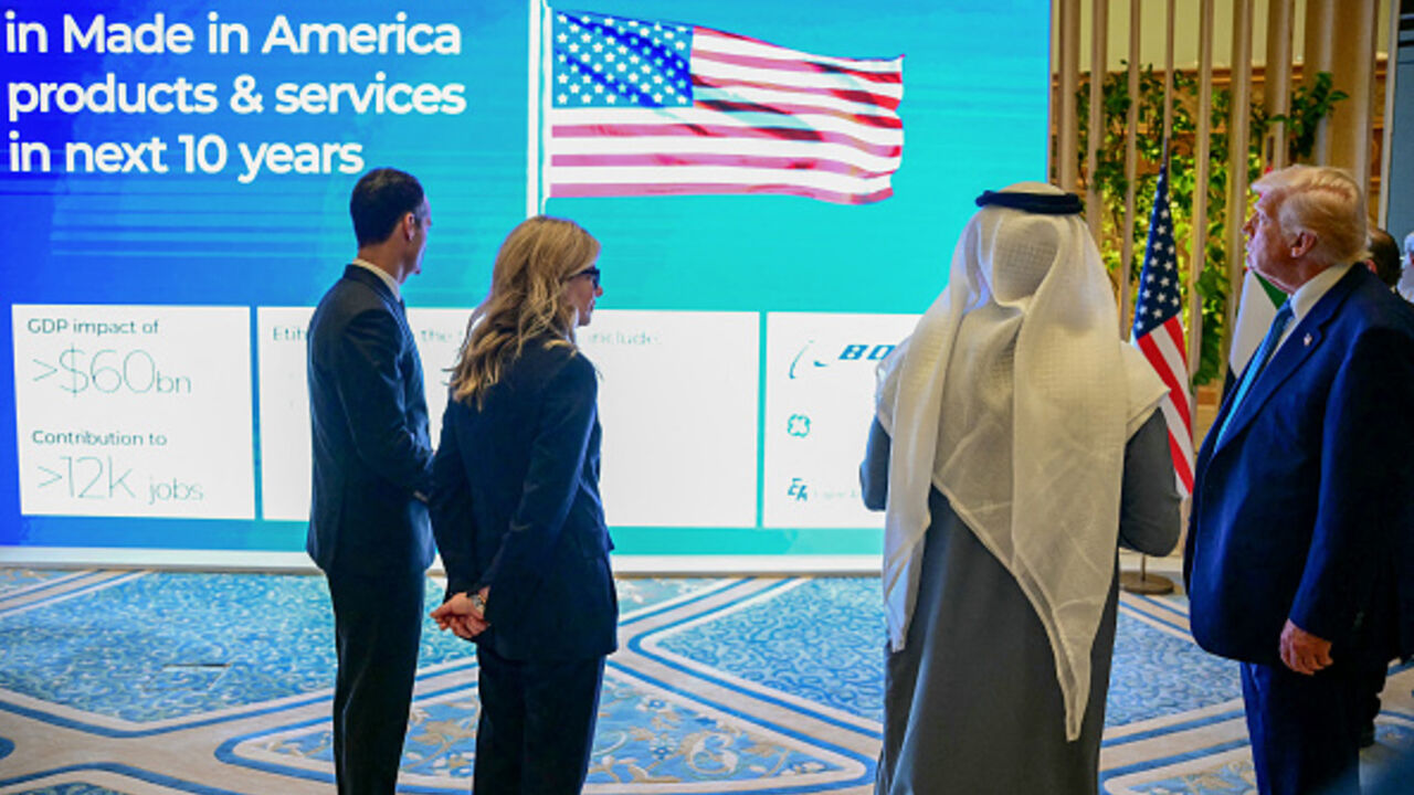 US President Donald Trump (R) attends a business forum in Abu Dhabi on May 16, 2025. Trump concluded on May 16 his Gulf tour in Abu Dhabi after overseeing the signing of another raft of multi-billion-dollar deals, while also securing a $1.4 trillion investment pledge from the UAE. (Photo by Giuseppe CACACE / AFP) (Photo by GIUSEPPE CACACE/AFP via Getty Images)