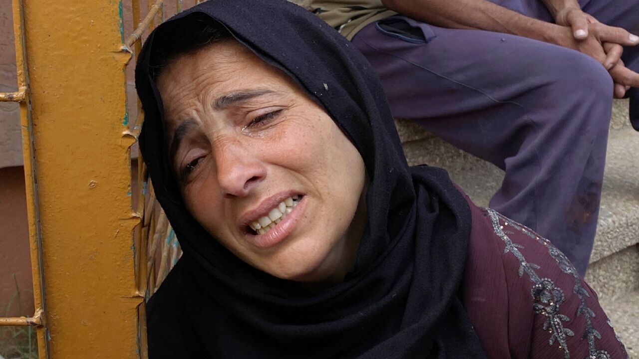 A Palestinian woman at the Nasser Hospital in Khan Yunis in southern Gaza mourns a relative killed in Israeli strikes