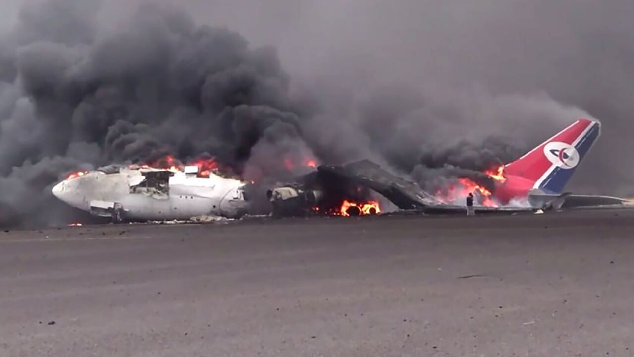 This picture released by Huthi media shows an airliner on fire in Yemen's rebel-held capital Sanaa following an Israeli strike on the airport Tuesday.
