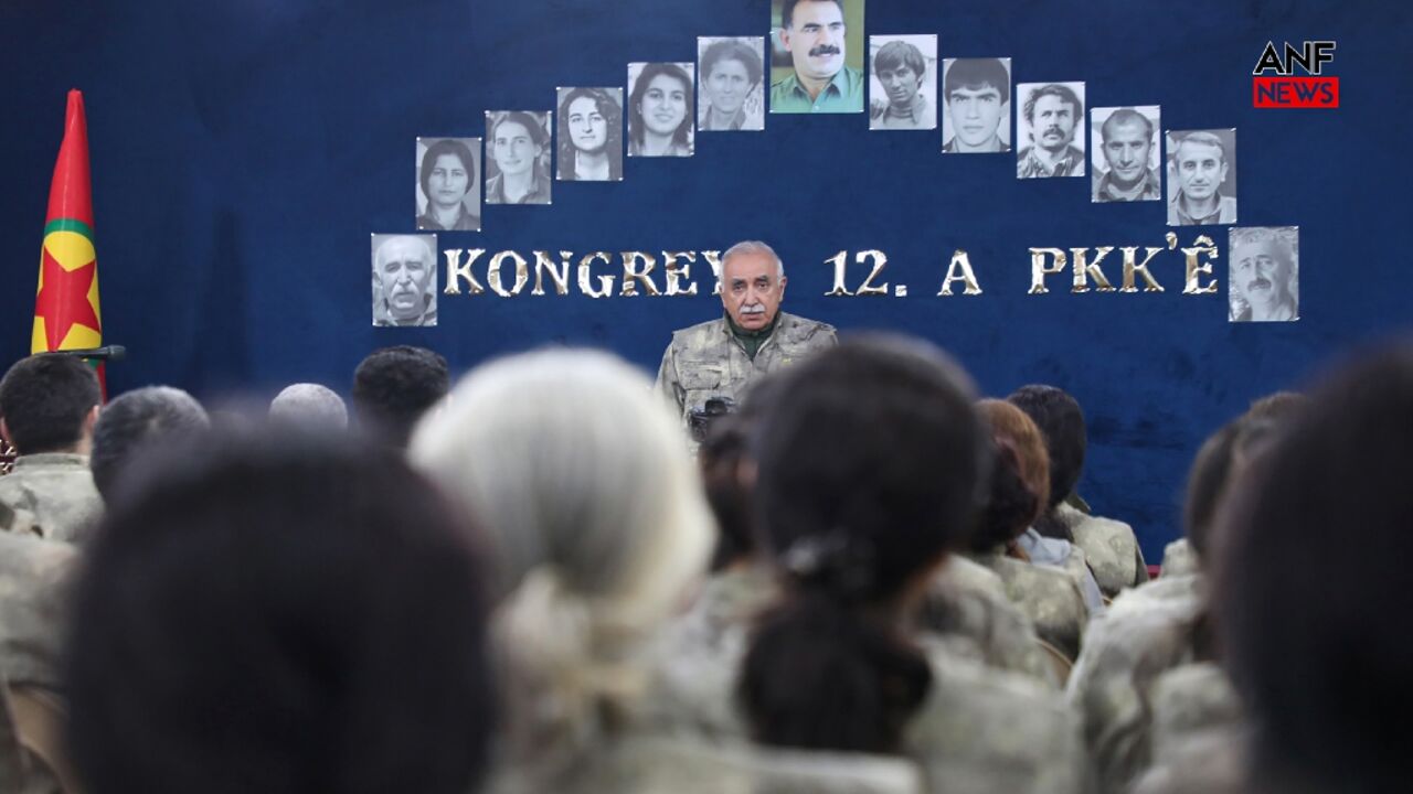 PKK head Murat Karayılan announcing the party's dissolution at an undisclosed location in northern Iraq
