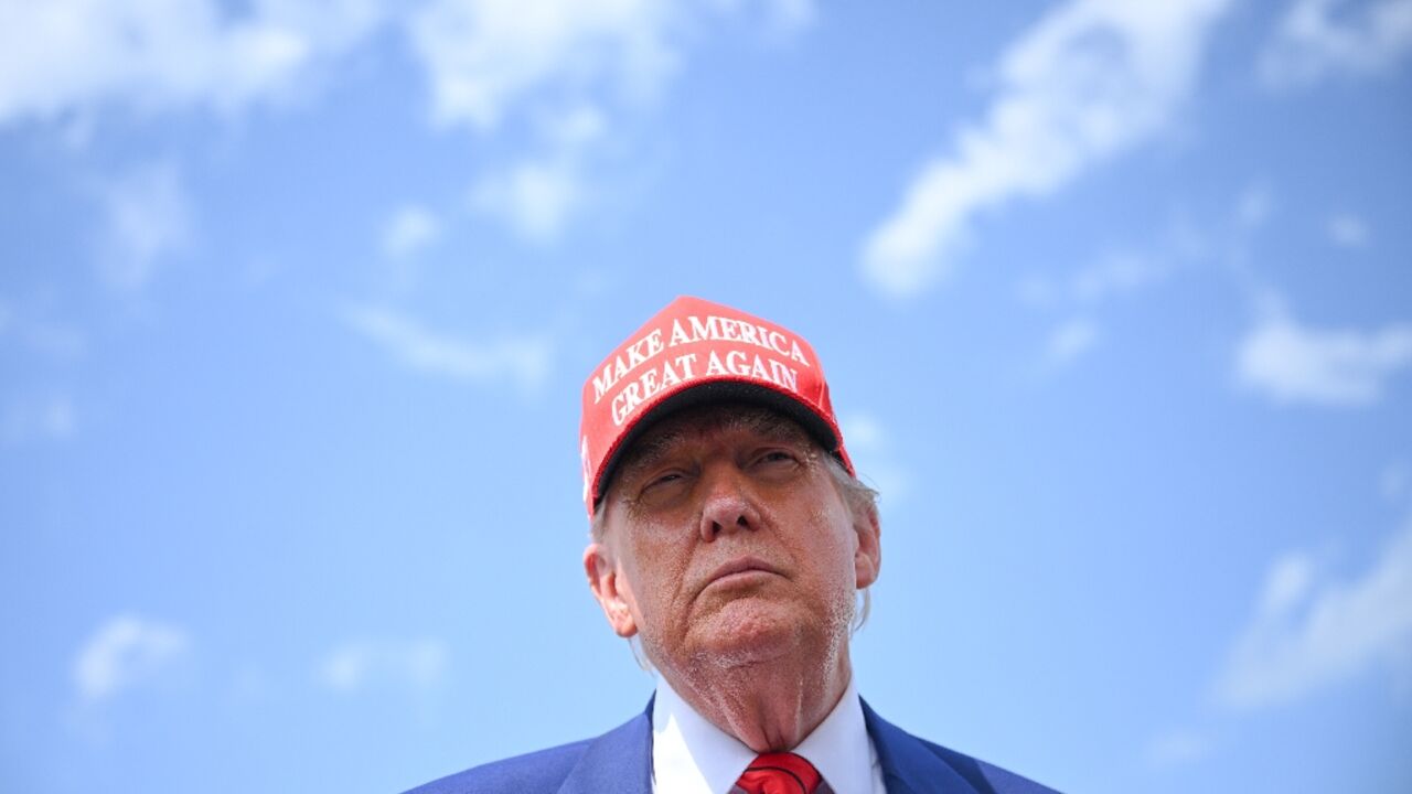 US President Donald Trump speaks to the press upon arrival at Morristown Municipal Airport in Morristown, New Jersey, on June 20, 2025