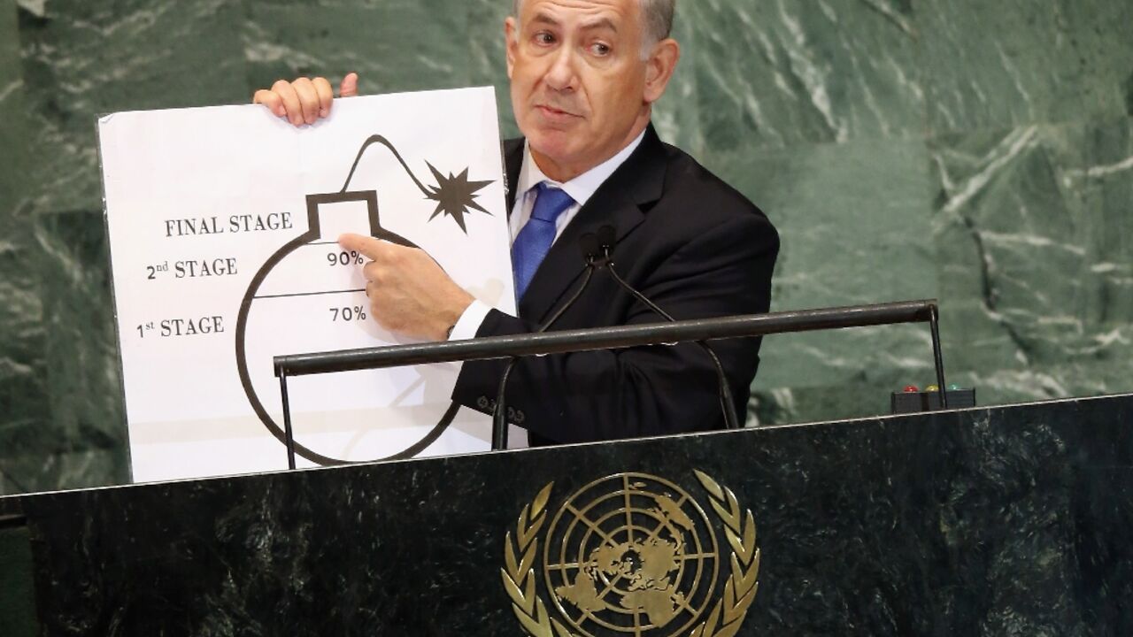 Israel's Prime Minister Benjamin Netanyahu shows a graphic of a bomb while discussing Iran at the United Nations General Assembly in 2012