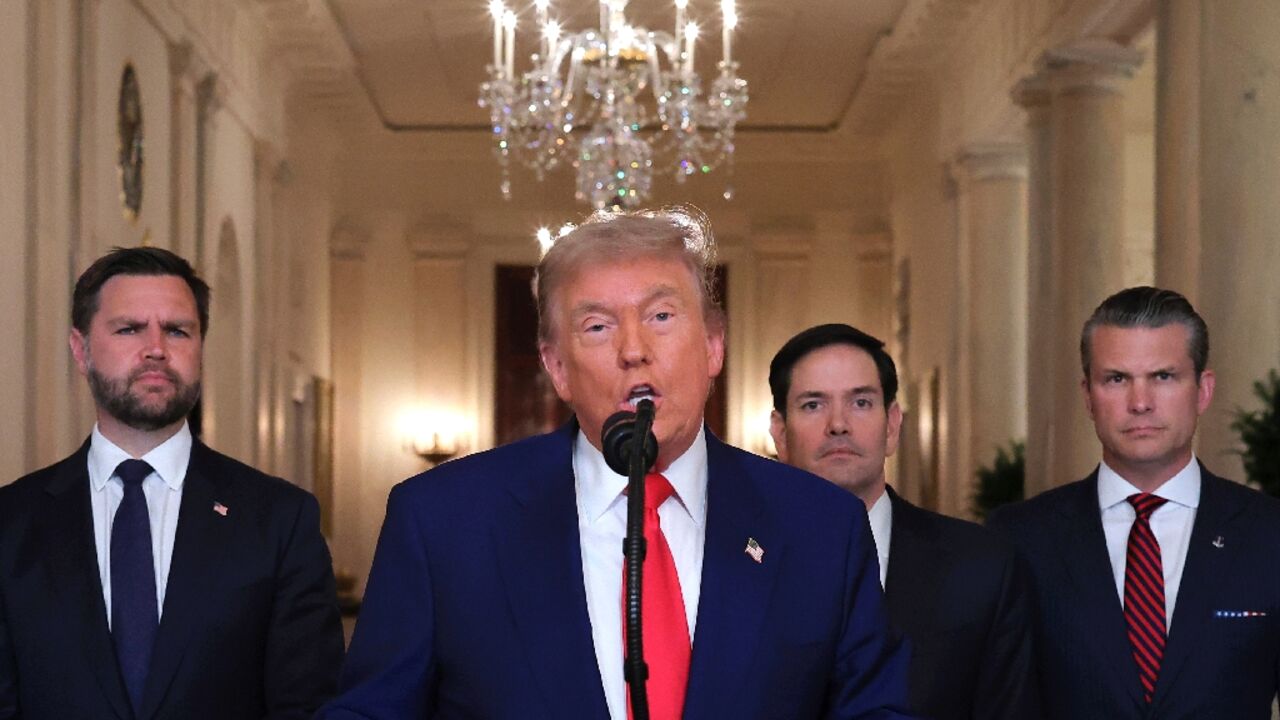 US President Donald Trump addresses the nation on strikes on Iran with Vice President JD Vance, Secretary of State Marco Rubio and Secretary of Defense Pete Hegseth behind him