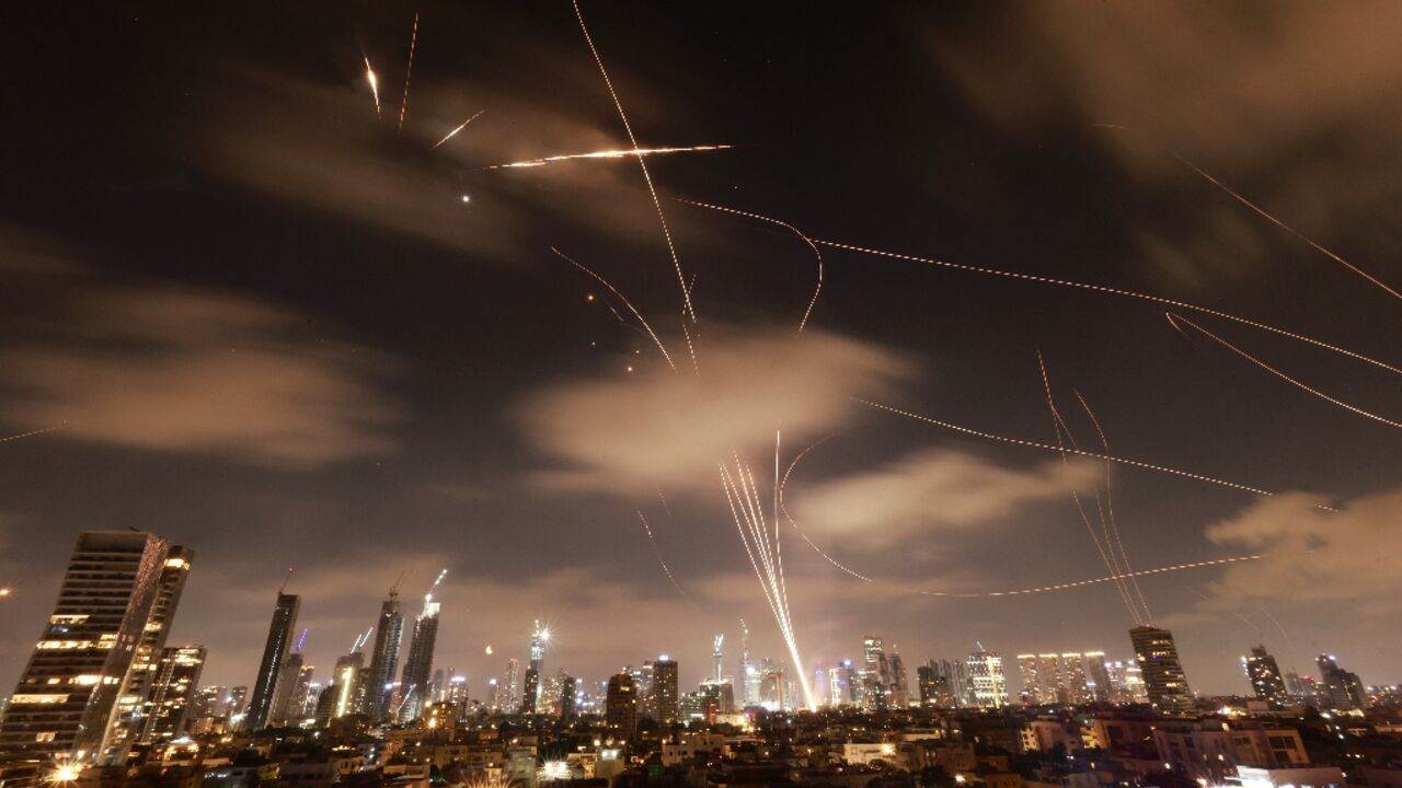 Israeli air defences intercept Iranian missiles over Tel Aviv 
