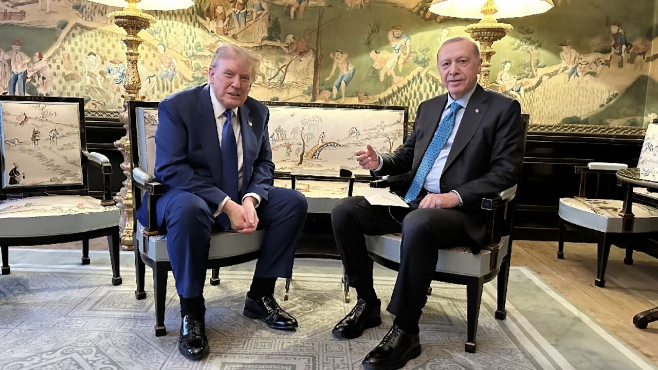 Turkey's President Recep Tayyip Erdogan (R) held talks with Donald Trump just hours after the US president announced a truce in the Iran-Israel war