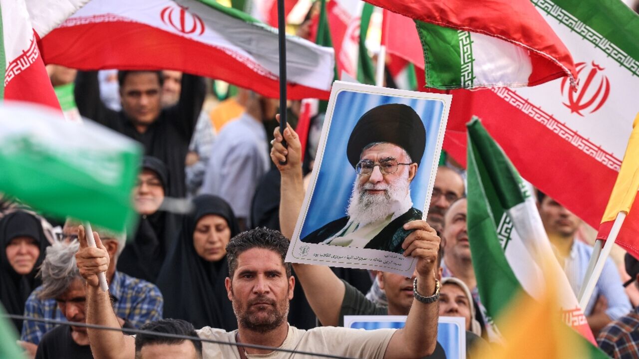 Iranians in Tehran celebrate the ceasefire with Israel after 12 days of war