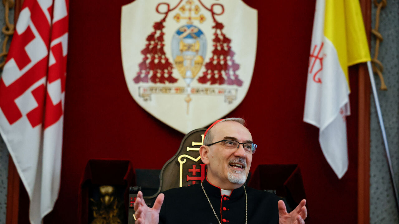 FILE PHOTO: Latin Patriarch of Jerusalem Archbishop Pierbattista Pizzaballa speaks during a press conference at the patriarchate headquarters in the old city of Jerusalem May 13, 2025. REUTERS/Ammar Awad/File Photo