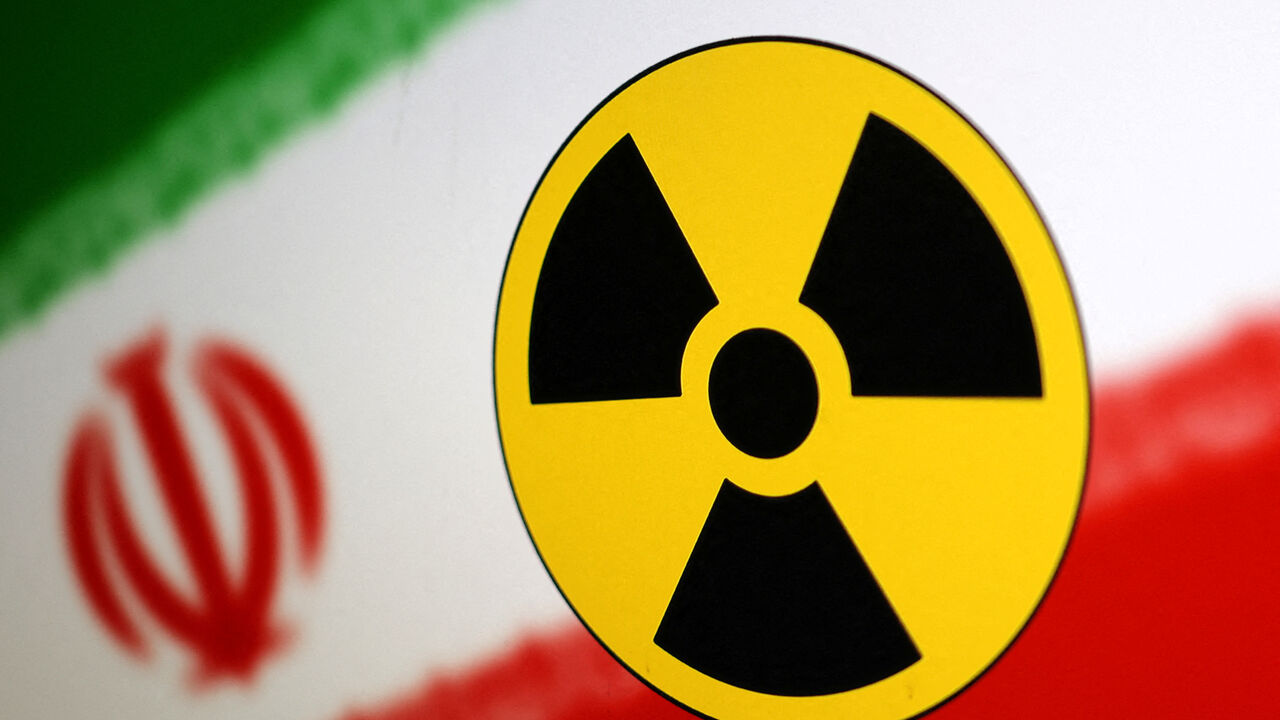 Nuclear symbol and Iran flag are seen in this illustration, July 21, 2022. REUTERS/Dado Ruvic/Illustration