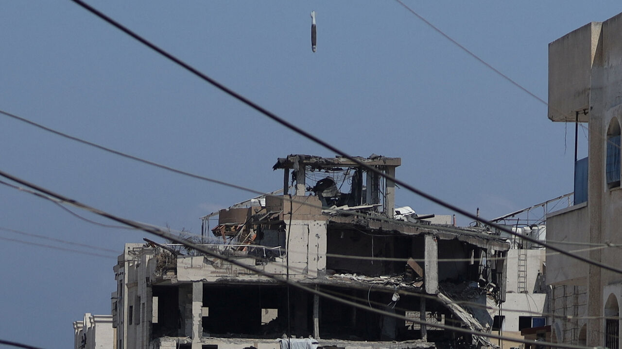 A missile lands during an Israeli strike on a residential building, in Gaza City July 21, 2025. REUTERS/Khamis Al-Rifi
