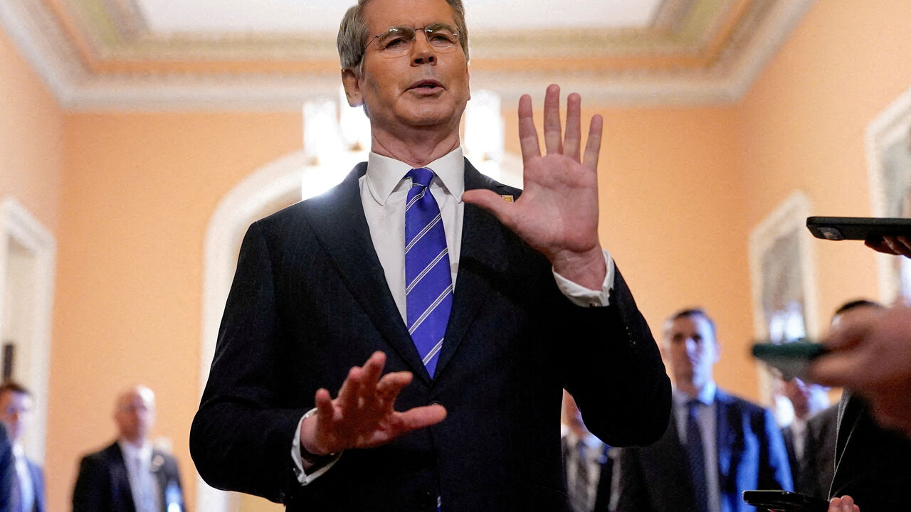 FILE PHOTO: U.S. Treasury Secretary Scott Bessent speaks to reporters at the U.S. Capitol in Washington, D.C., U.S., June 27, 2025. REUTERS/Elizabeth Frantz/File Photo