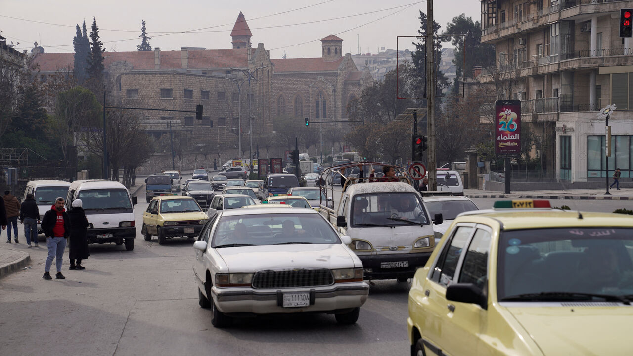 FILE PHOTO: Traffic moves through the streets of Aleppo, Syria, as daily life returns days after rebels seized the capital Damascus and ousted Syria's Bashar al-Assad, December 11, 2024. REUTERS/Karam al-Masri/File Photo