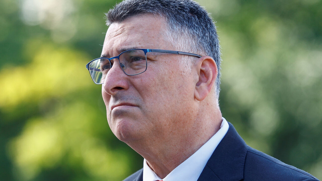FILE PHOTO: Israeli Foreign Minister Gideon Saar looks on as he visits the monument to victims of the famine of 1932-33 (Holodomor) outside the Saint Michael's Cathedral, amid Russia's attack on Ukraine, Kyiv, Ukraine July 23, 2025. REUTERS/Valentyn Ogirenko/File Photo