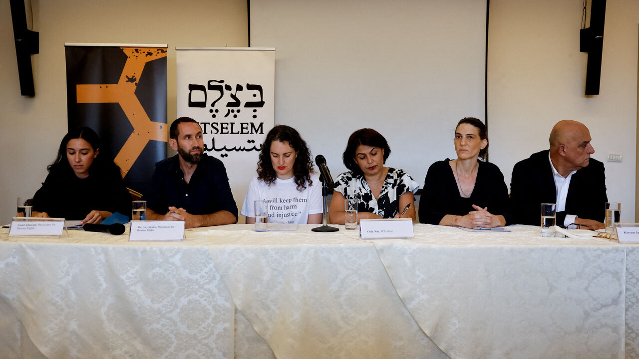 FILE PHOTO: Israeli human rights groups hold a press conference to issue a report saying Israel is committing a genocide in Gaza, in East Jerusalem, July 28, 2025. REUTERS/Ammar Awad/File Photo