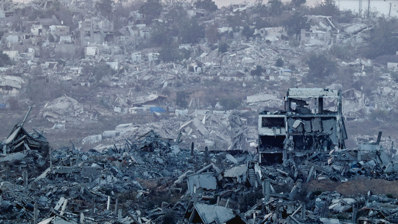 Destroyed buildings lie in Gaza, as seen from the Israeli side of the border,  July 28, 2025. REUTERS/Amir Cohen