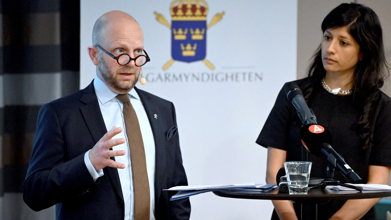Henrik Olin, Deputy Chief Prosecutor at the National Unit for Security Cases, and Reena Devgun, Senior Prosecutor at the National Unit against International and Organized Crime, attend a press conference on 27 May 2025 in Stockholm, Sweden. The Swedish Prosecution Authority has indicted Swedish man Osama Krayem, 32, for gross war crimes and terrorism in Syria. TT News Agency/Jonas Ekstromer/via REUTERS/File Photo