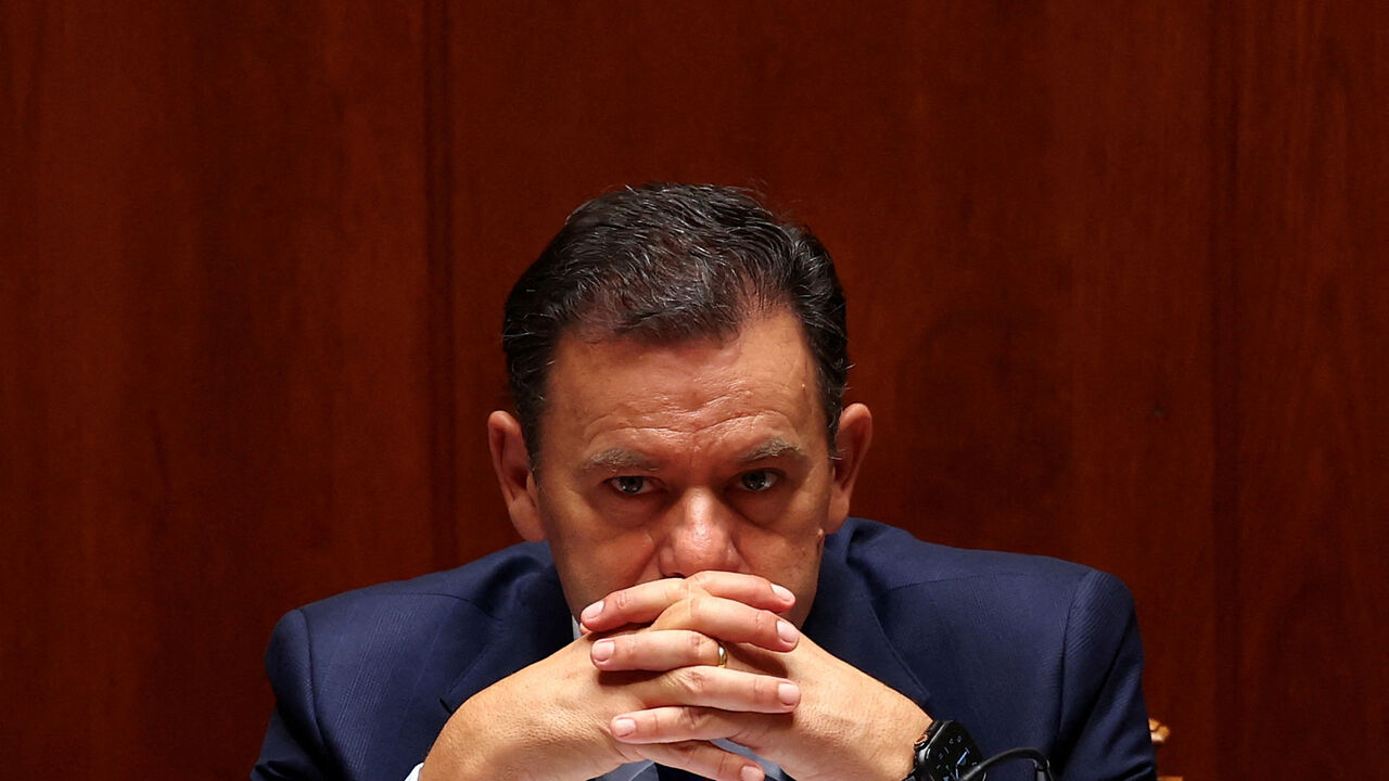 FILE PHOTO: Portugal's Prime Minister Luis Montenegro gestures during the debate on the new elected government program, at the parliament in Lisbon, Portugal, June 18, 2025. REUTERS/Pedro Nunes/File Photo