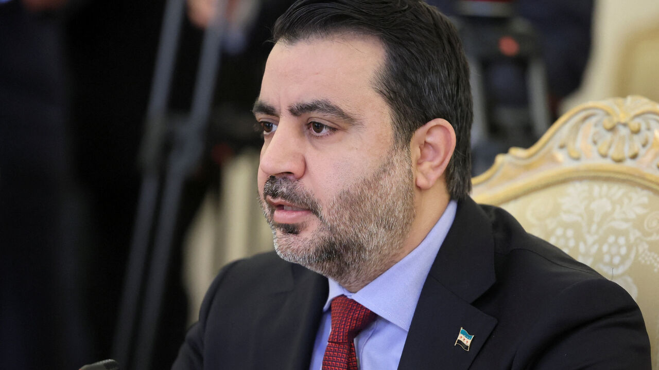 Syrian Foreign Minister Asaad Hassan al-Shibani attends a meeting with Russian Foreign Minister Sergei Lavrov in Moscow, Russia, July 31, 2025. REUTERS/Shamil Zhumatov/Pool