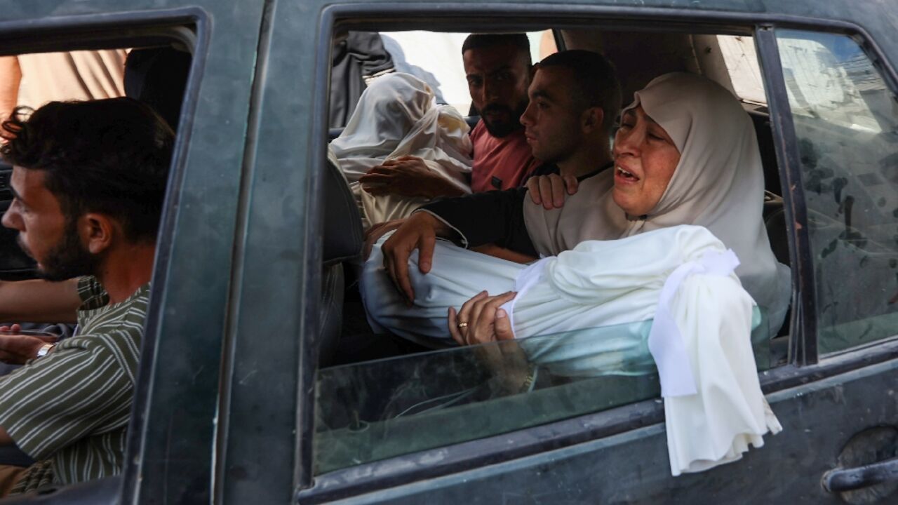 Crowds of mourners gathered at Gaza City's Al-Shifa hospital