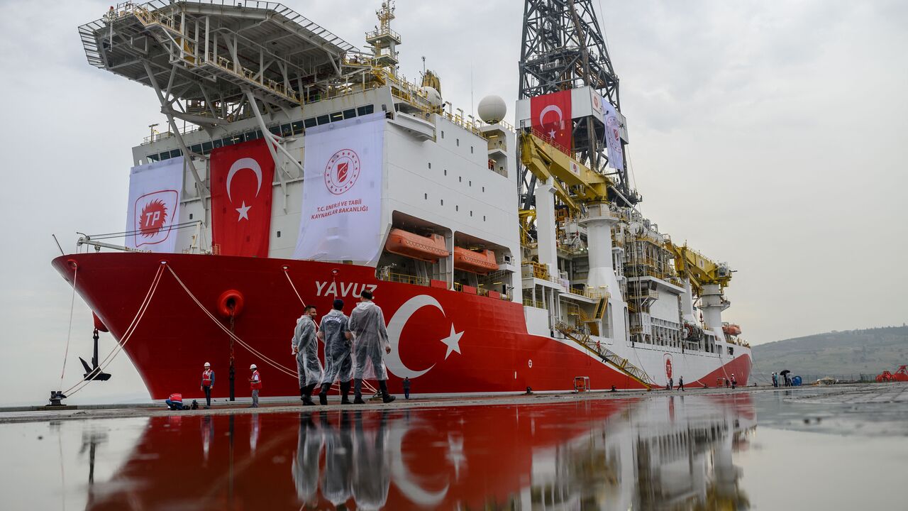 Turkish police officers patrols next to the drilling ship 'Yavuz'