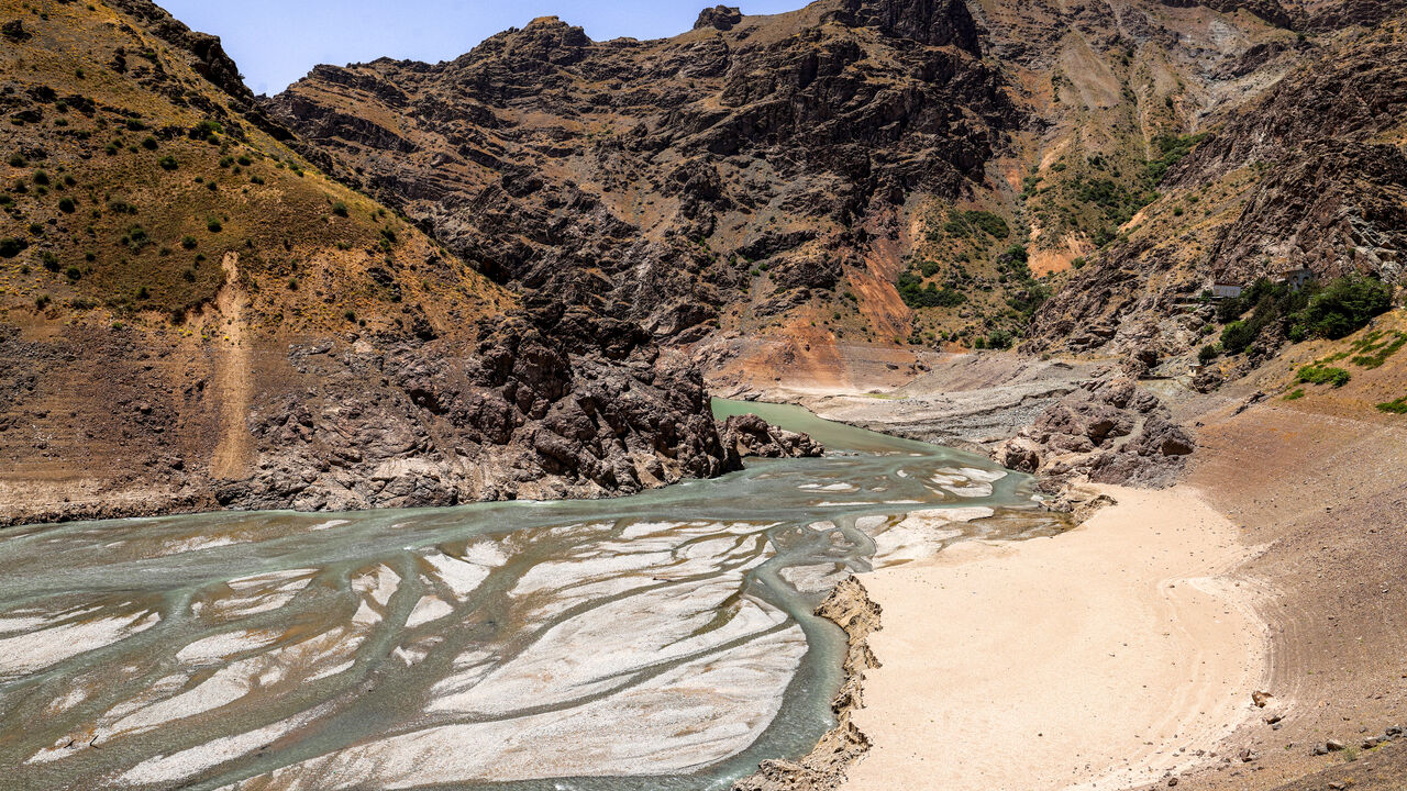The low water inlet of the river upstream of the Amir Kabir dam along the Karaj river is pictured in Iran's northern Alborz mountain range on June 1, 2025. Tehran is facing a water shortage due to low rainfall last year and the beginning of summer. (Photo by ATTA KENARE / AFP) (Photo by ATTA KENARE/AFP via Getty Images)