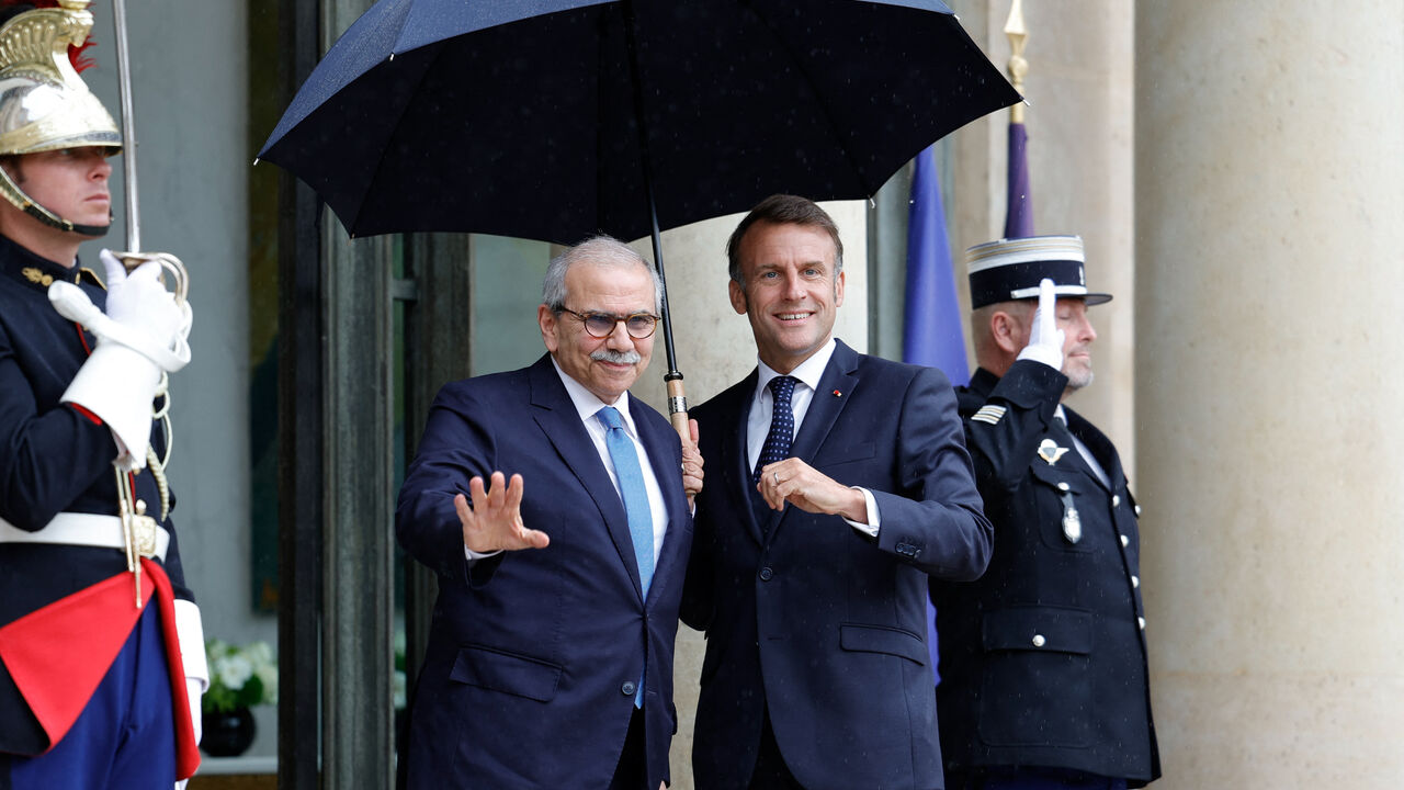 TOPSHOT - France's President Emmanuel Macron (2nd-R) and Lebanon's Prime Minister Nawaf Salam (2nd-L) pose ahead of their working lunch at the presidential Elysee Palace in Paris, on July 24, 2025. (Photo by GEOFFROY VAN DER HASSELT / AFP) (Photo by GEOFFROY VAN DER HASSELT/AFP via Getty Images)