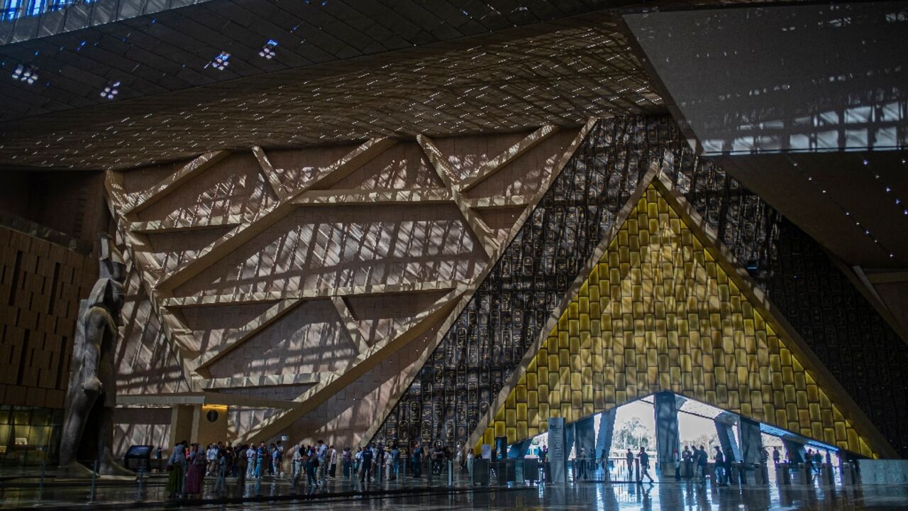 Visitors tour the Grand Egyptian Museum in Giza