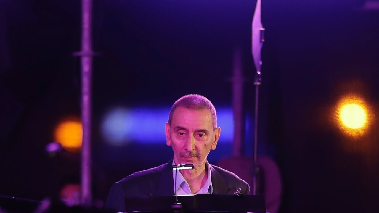 Lebanese pianist, composer and playwright Ziad Rahbani performs during the Beirut Holidays 2019 Festival at the waterfront in the Lebanese capital