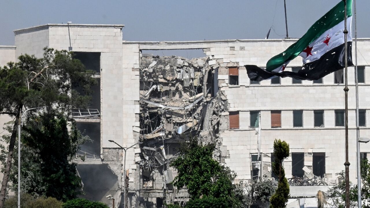A view of the damage following Israeli strikes on the Syrian army and defence ministry headquarters in Damascus