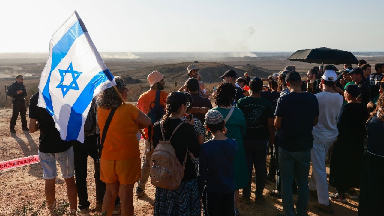 Israeli settlement activists gather on a hill overlooking war-devastated Gaza to stake their claim to the battered territory.