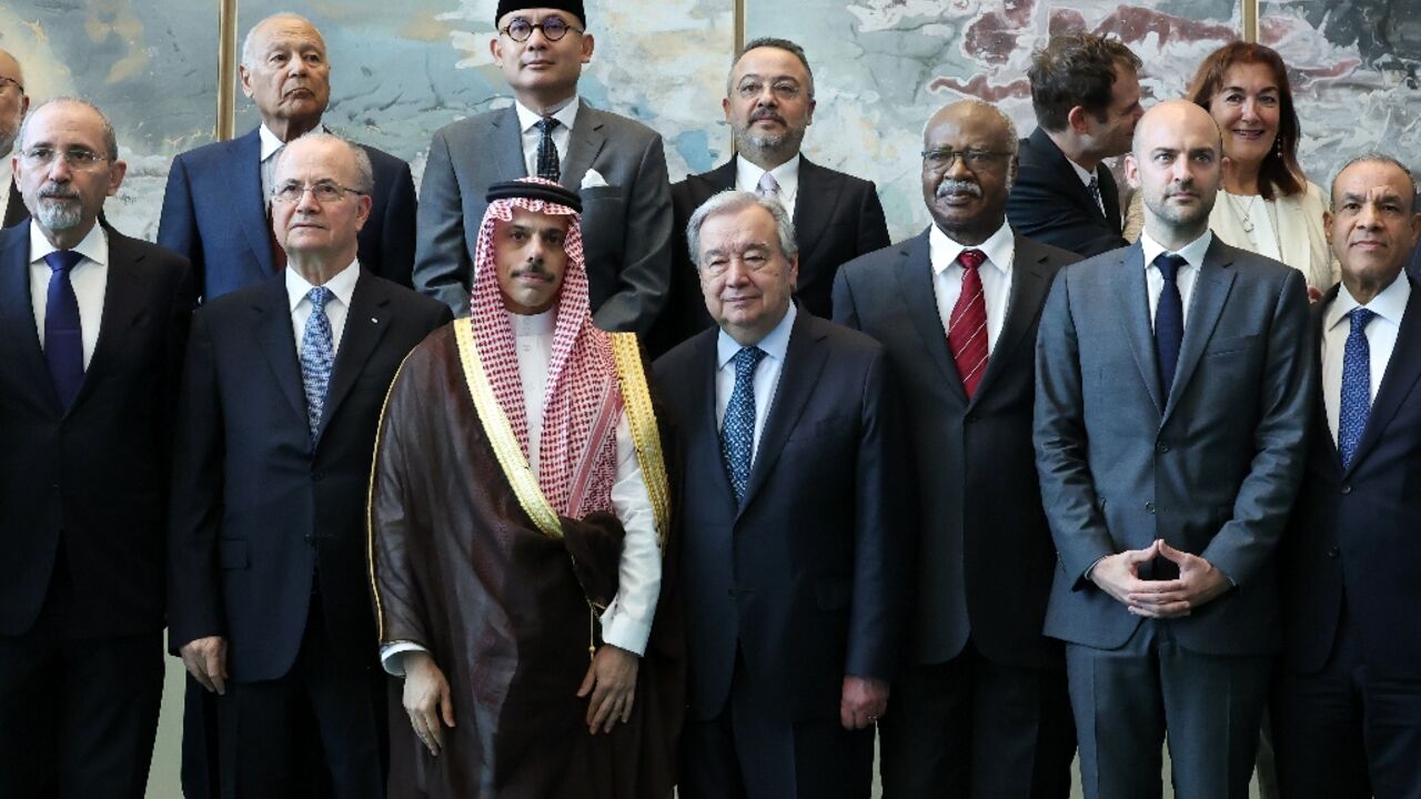 Palestinian prime minister Mohammad Mustafa (2L), French Foreign Minister Jean-Noel Barrot (2R) and others meet with UN Secretary-General Antonio Guterres (C) as they begin a conference on a two-state solution for Israel and the Palestinians