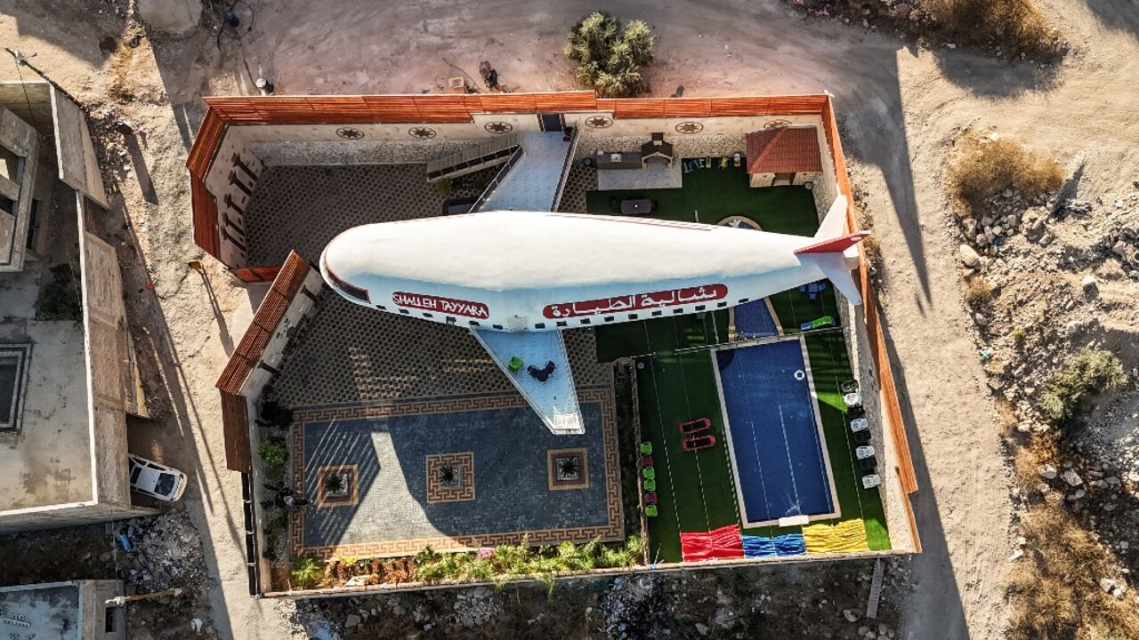 This aerial view shows a guest house built in the shape of an aeroplane in the Palestinian town of Qaffin, in the northwest of the occupied West Bank