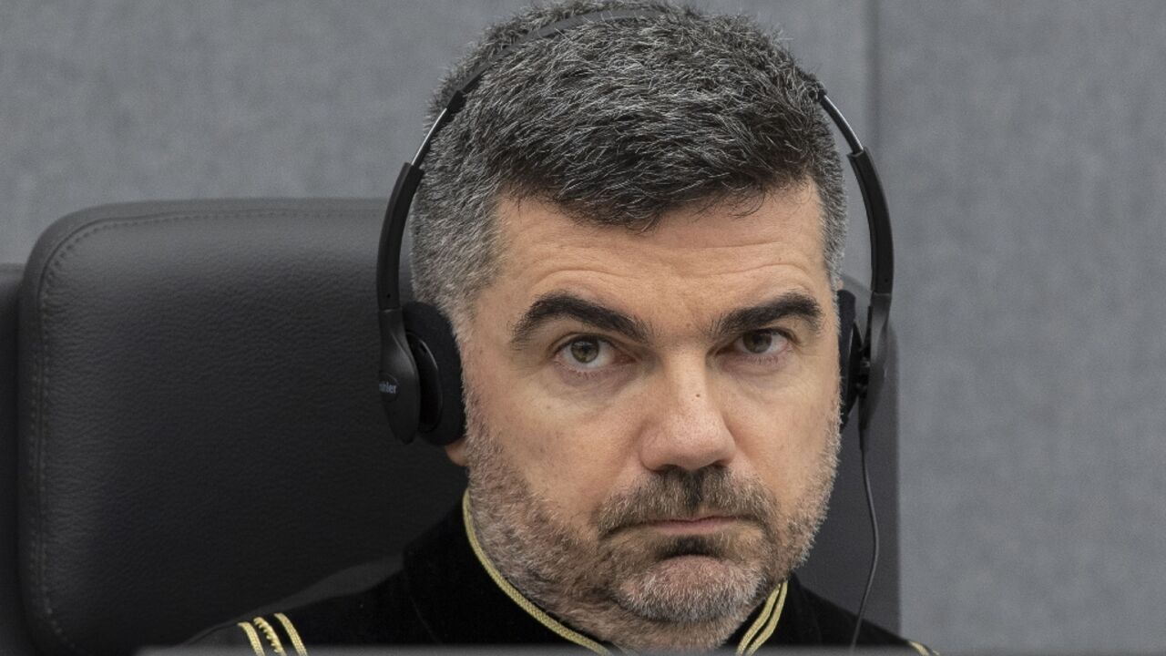 Judge Nicolas Guillou opens a court session on Kosovo in The Hague in November 2020