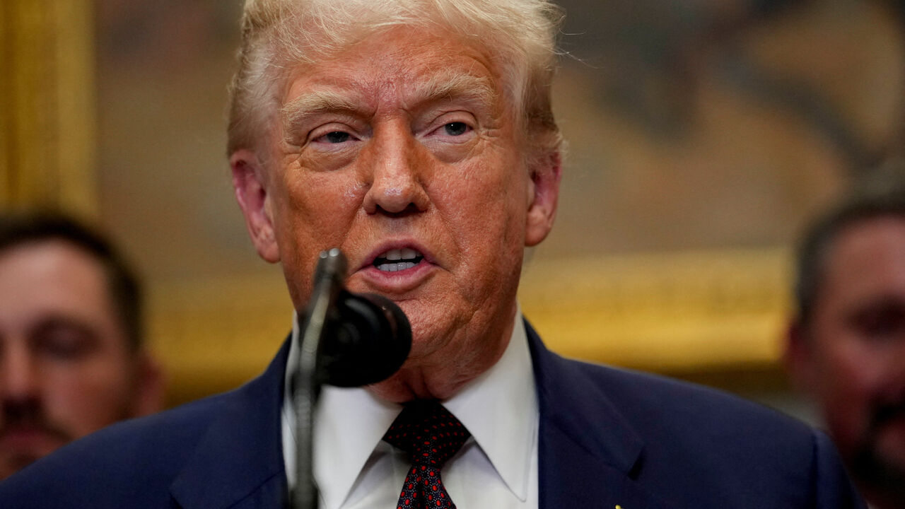 FILE PHOTO: U.S. President Donald Trump delivers remarks in the Roosevelt Room at the White House in Washington, D.C., U.S., July 31, 2025. REUTERS/Kent Nishimura/File Photo